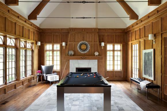Wood Paneled Game Room With Sleek Pool Table Wood Paneled Game Room With Sleek Pool Table