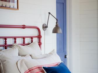 White Country-Style Bedroom With Red Iron Headboard