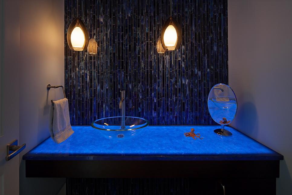 Eclectic Powder Room With Recycled, Light Up Blue Countertop Small Bathroom With Black Backsplash and Blue Countertop