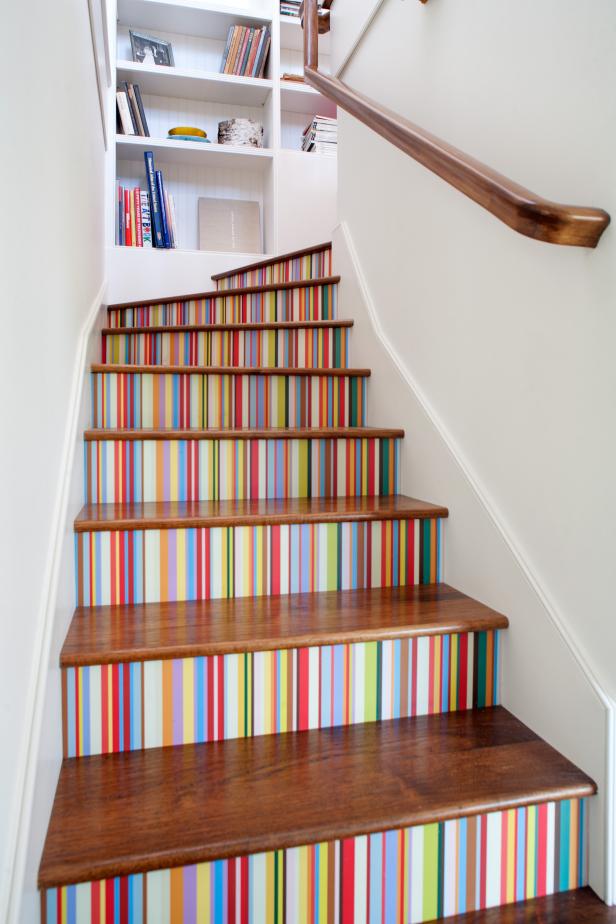 Custom Wallpaper Brightens Staircase White Stairway With Multicolored Striped Wallpaper on Stair Risers