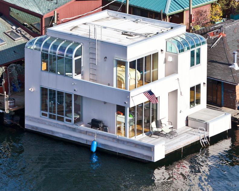 White Houseboat With Wraparound Windows