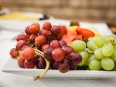 Red and Green Grapes on Fruit Plate 