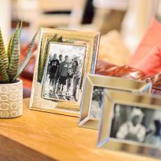 Silver Picture Frames on Living Room Console Table