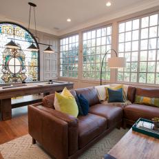 Contemporary Living Room With Arched Stain Glass Window