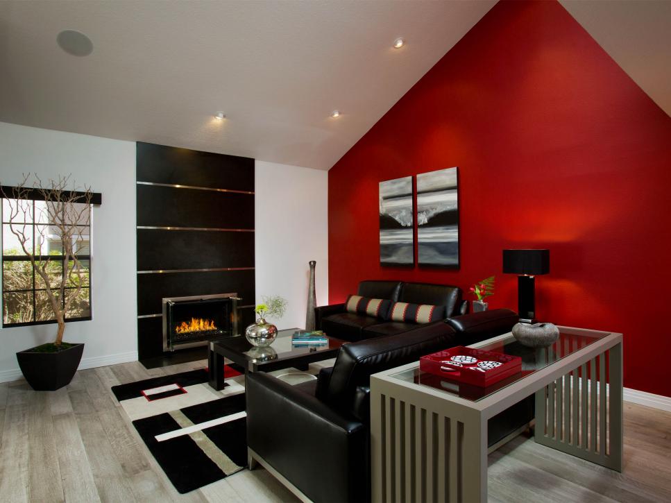 Living Space With Bold Red Focal Wall and Modern Black Furnishings