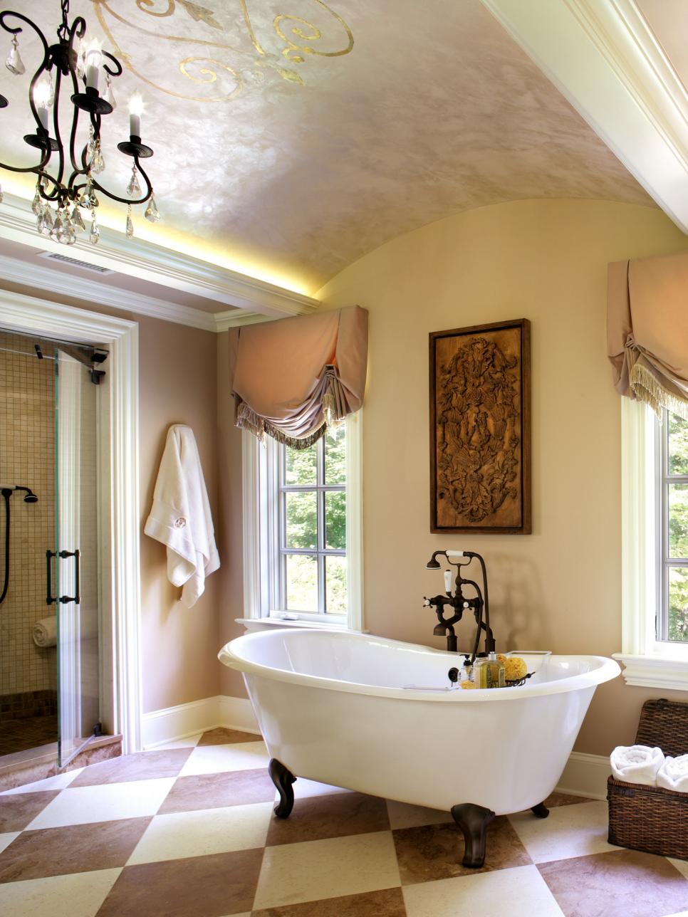 Purple and White Feminine French-Inspired Bathroom With Claw-Foot Tub