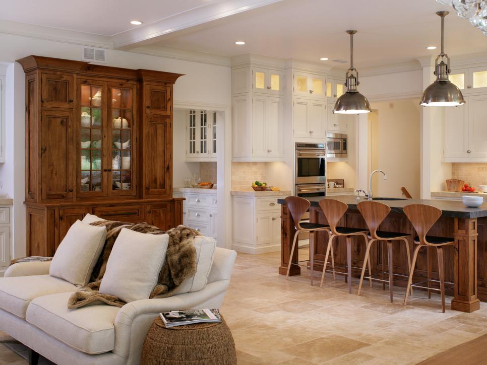 White Eat-In Transitional Kitchen With Wood Accents and Travertine  