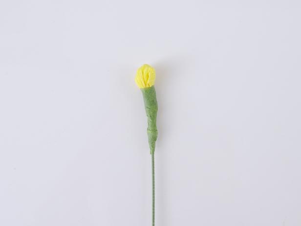 Twist the floral tape around the crepe paper and wire so they are seamlessly connected.