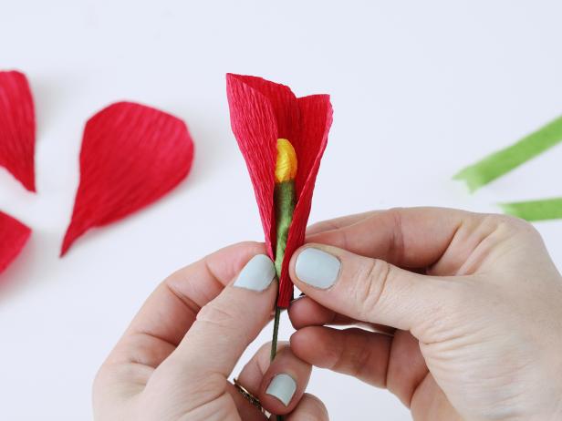 Arrange the inner petals around the stamen.