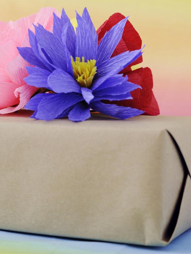 Use these crepe paper flower bouquets as eye-catching gift toppers.