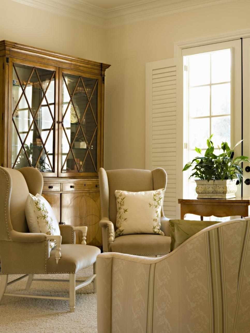 Neutral Sitting Room With Wingback Chairs