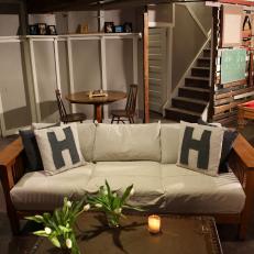 Basement Sitting Area With Cozy Vintage Sofa