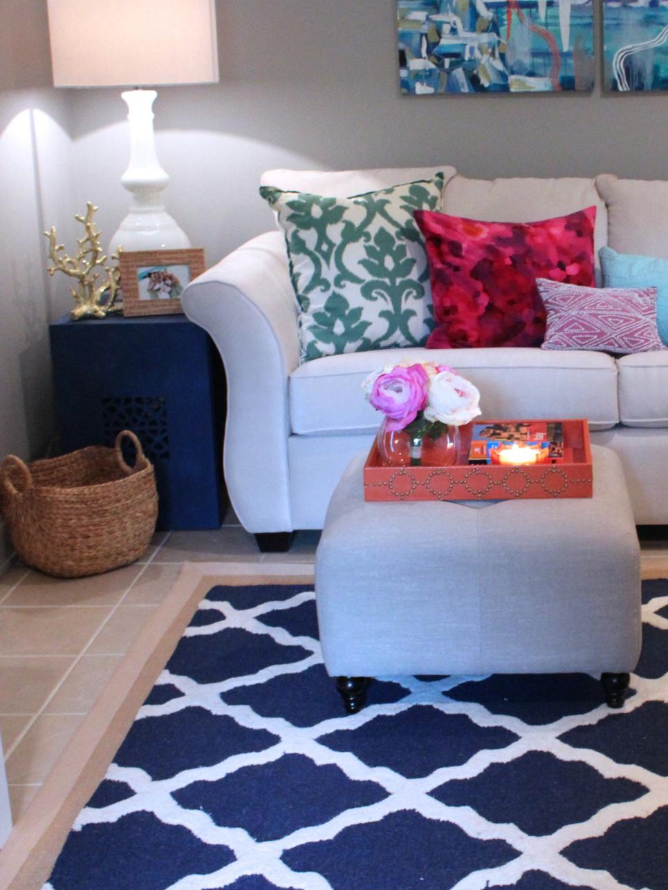Neutral Sofa with Colorful Pillows and Navy and White Trellis Rug