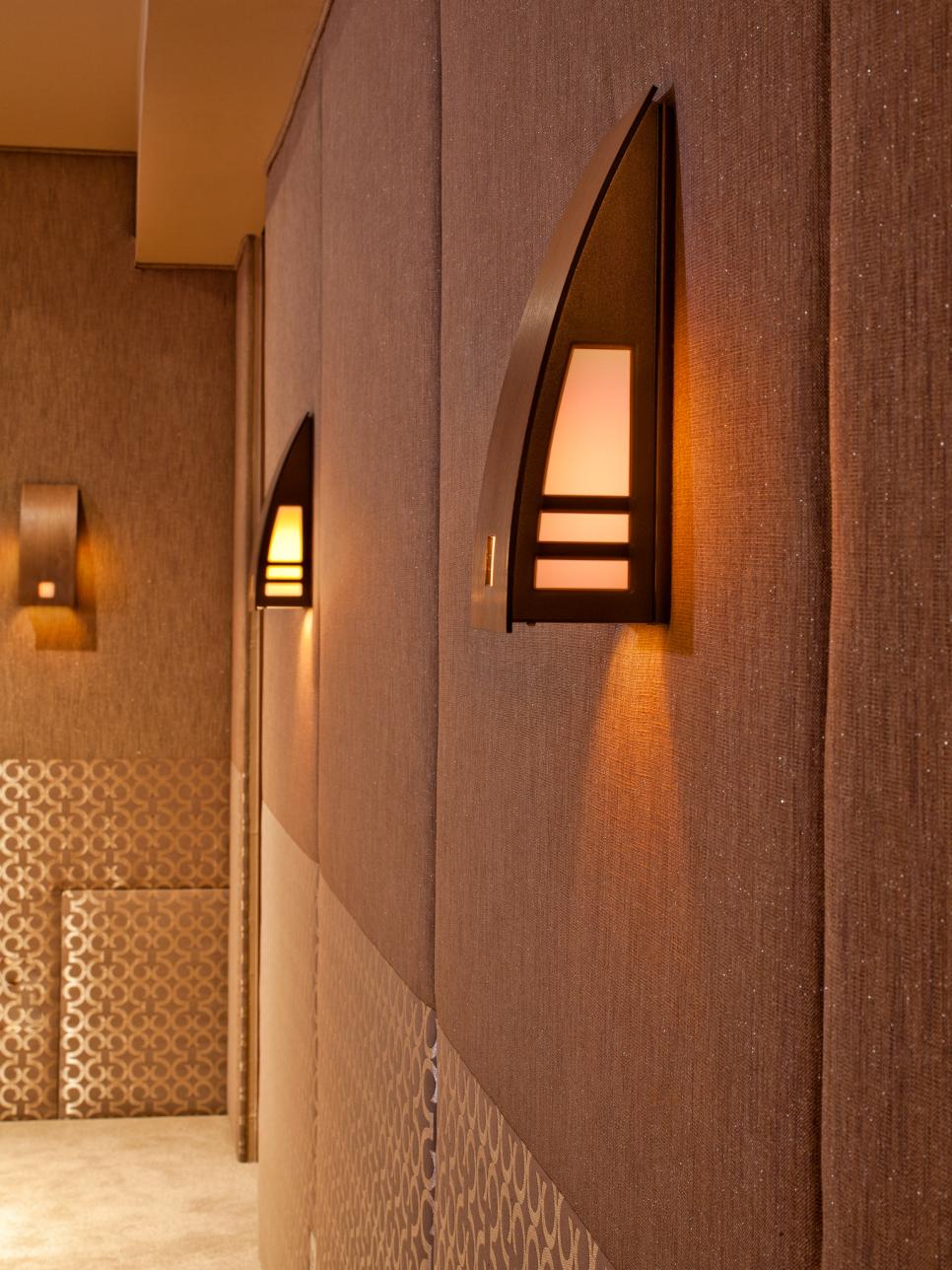 Brown Media Room With Contemporary Sconce Lights and Padded Soundproofed Walls