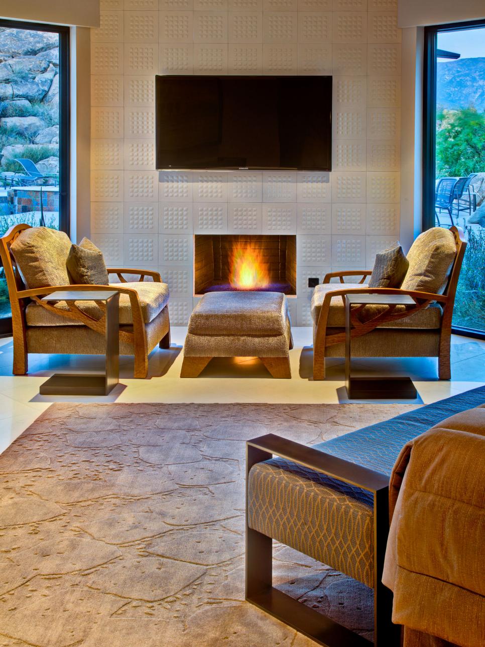 Neutral Sitting Area With Television and Fireplace