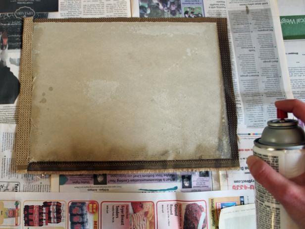 Carefully spray just the edges of liner's back with adhesive to secure lining fabric.