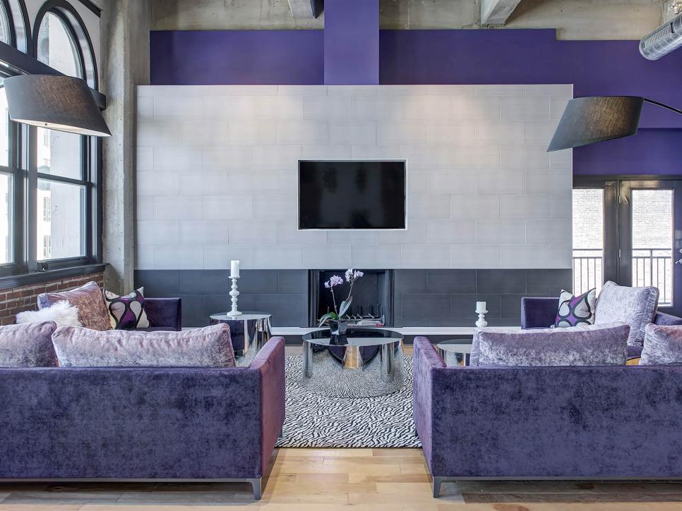 Urban Living Room with Purple Sofas and Metallic Coffee Tables