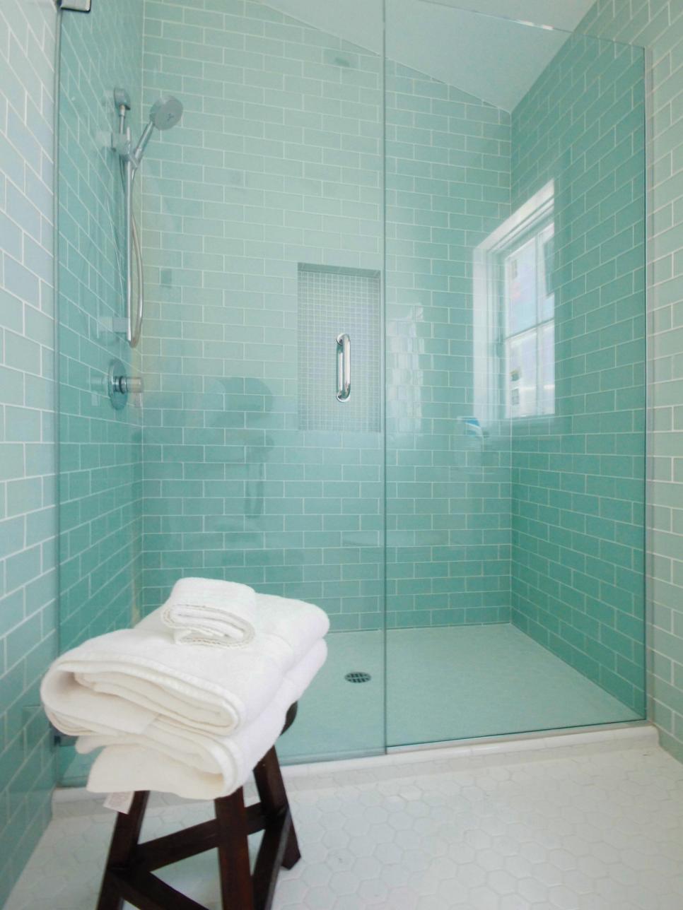 Mint-Colored Shower With Frameless Glass Door