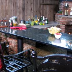 Outdoor Kitchen With Brick Bar Area 
