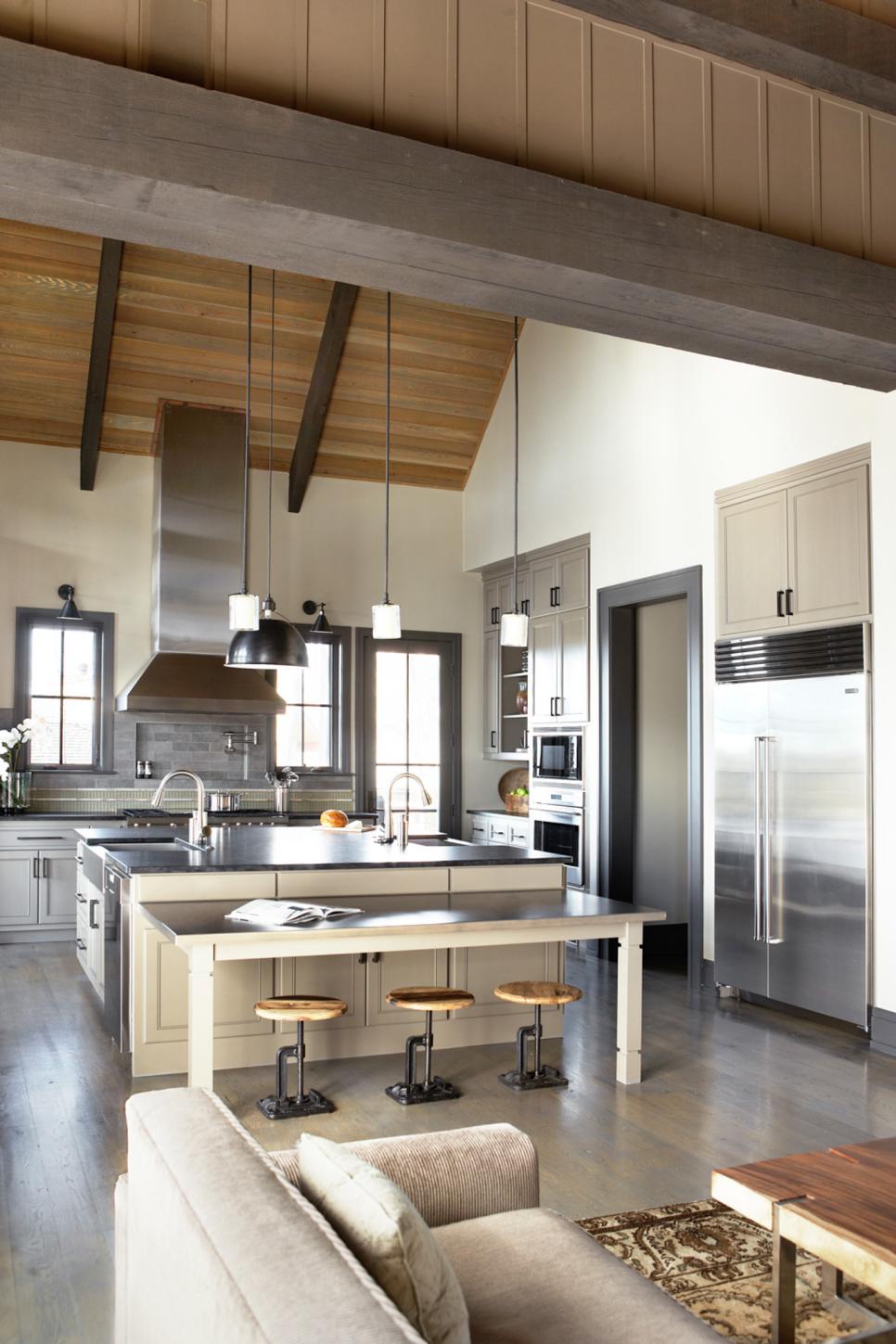 Industrial Kitchen With Exposed Beams and Island