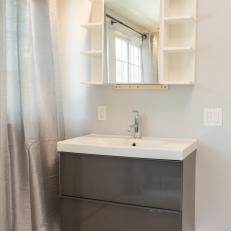 Sleek Gray Vanity in Contemporary Bathroom