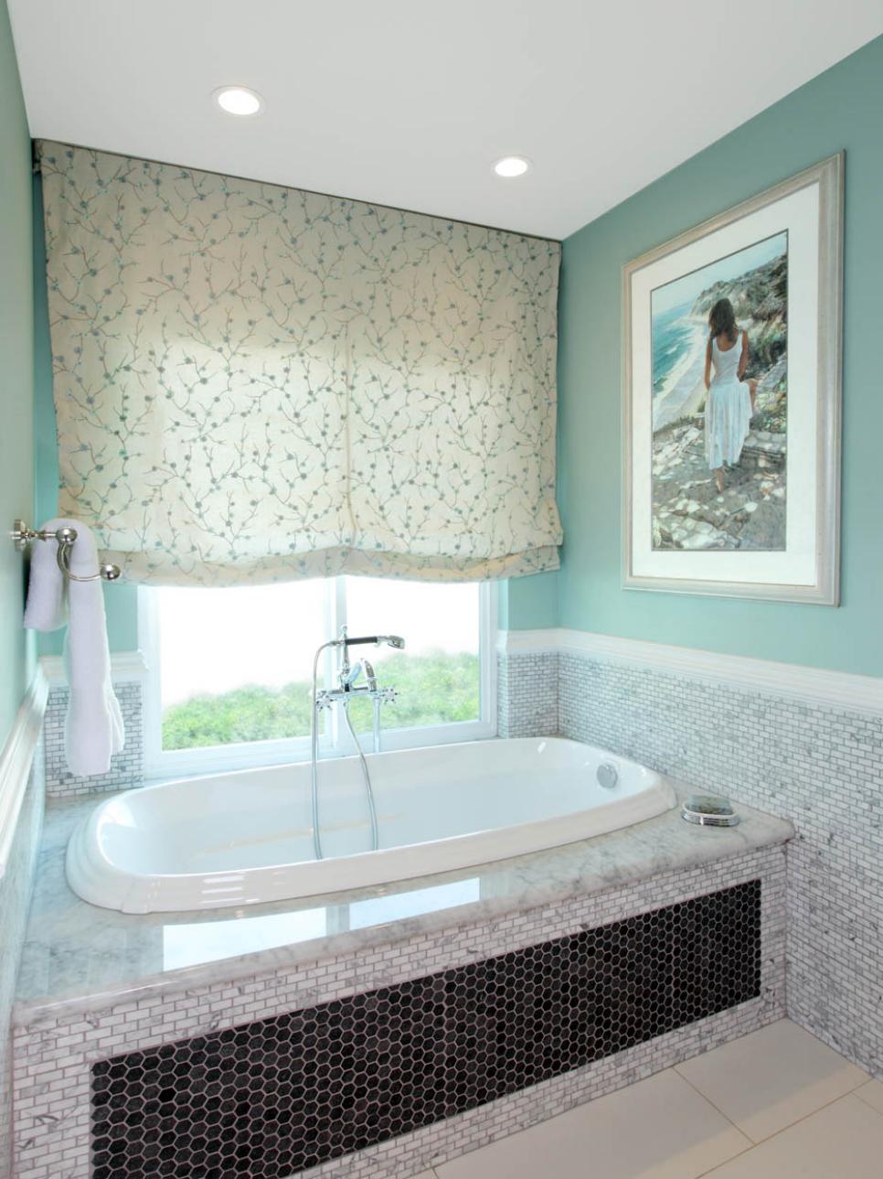 Teal Master Bathroom with Soak Tub Surrounded by Tile 