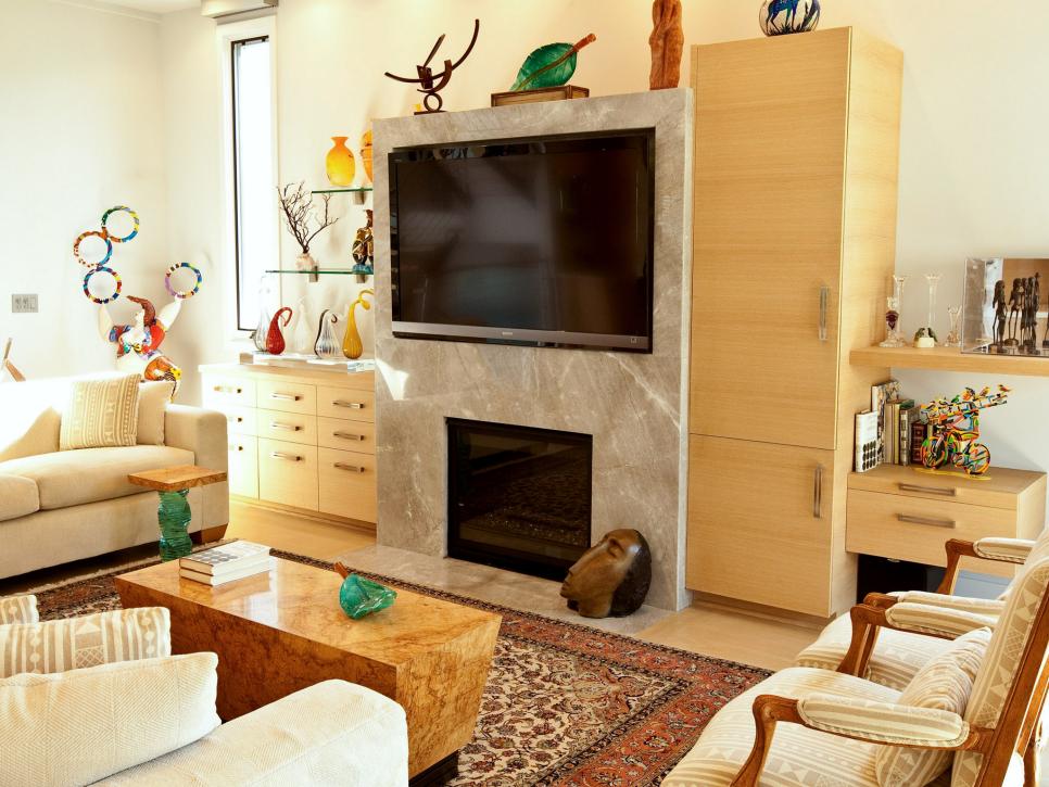 Sitting Area With Modern Travertine Fireplace and Eclectic Art