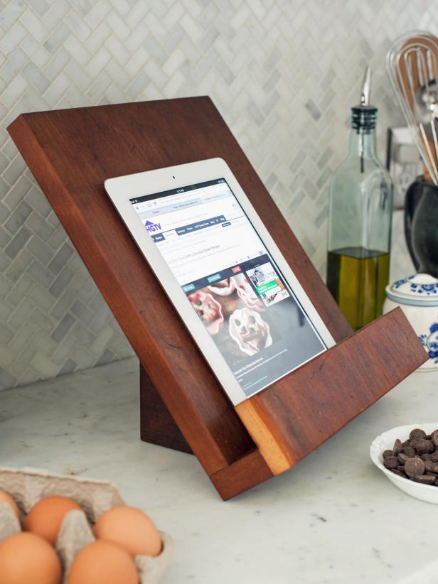 This cookbook stand was designed to hold most cookbooks as well as a tablet, but size and angle can be adjusted to suit personal needs and tastes.