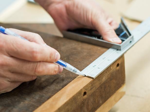 Measure in 3" from each side of the back to determine placement of supports for cookbook stand.