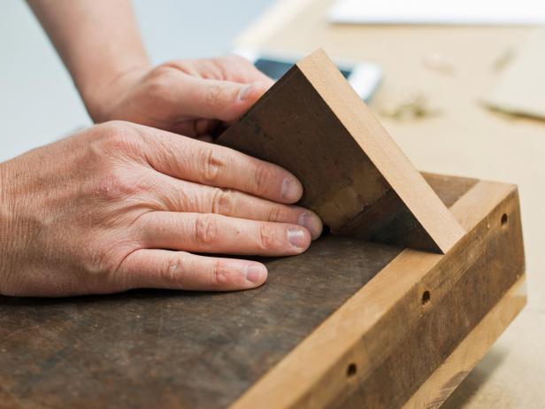 Measure in 3" from each side of the back to determine placement of supports for cookbook stand. Mark with a pencil. Outside edge of support will line up with marked line.