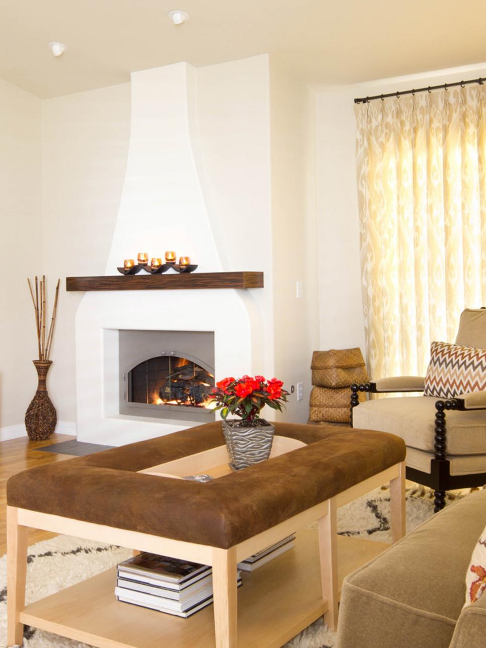 White Living Room with Adobe Fireplace and Custom Coffee Table