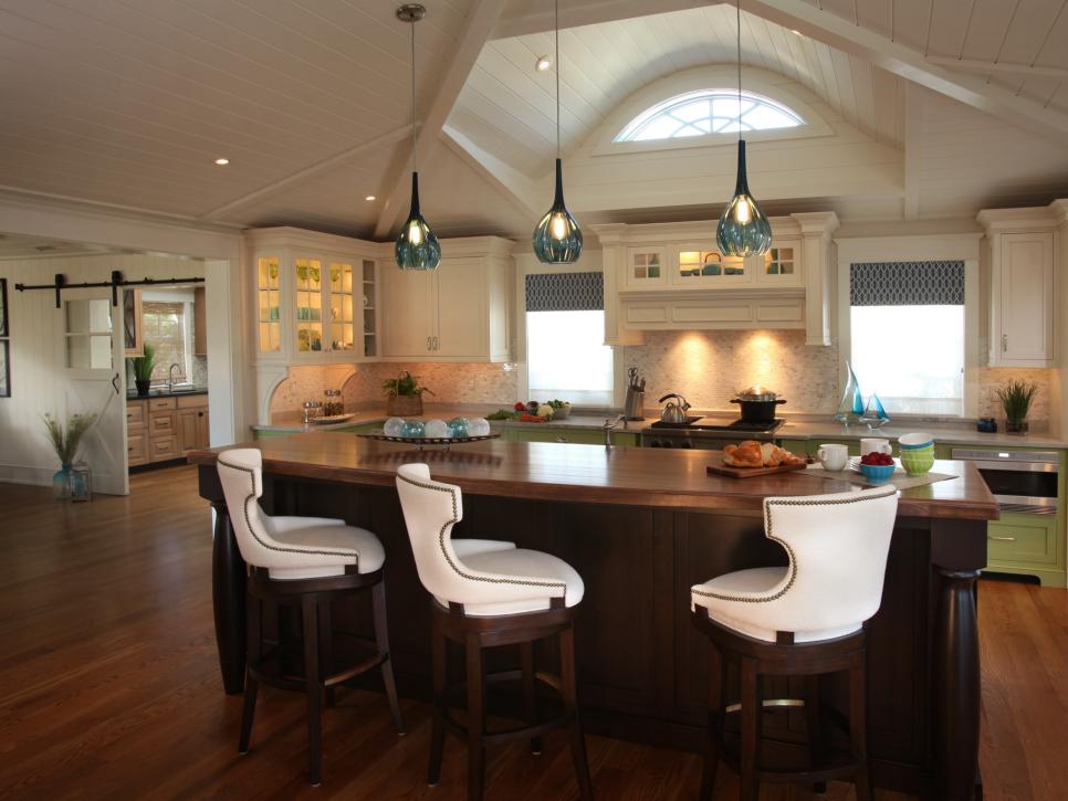 Open Concept Kitchen With Beamed Ceiling and Large Island