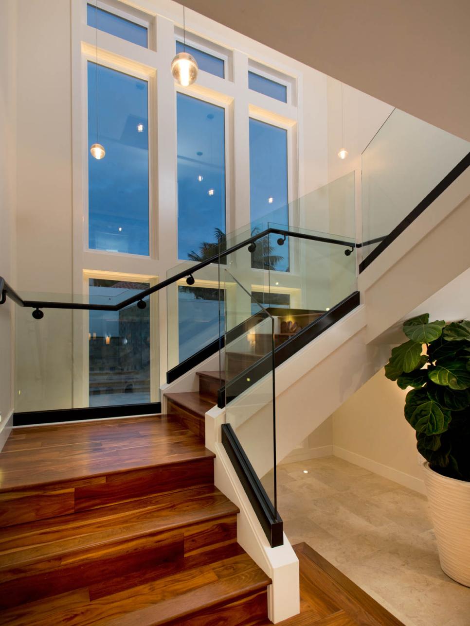 Contemporary Wood Staircase with Black and Glass Accents