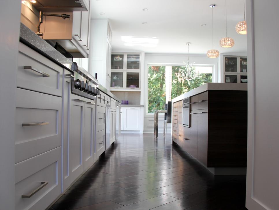 White Contemporary Kitchen With Dark Hardwood Floors
