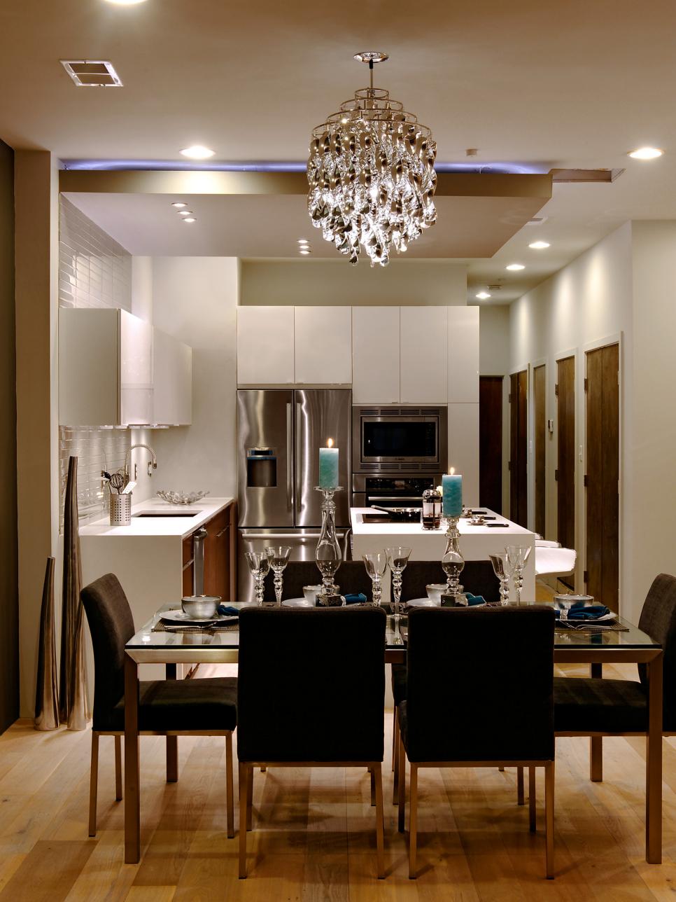 Glam Dining Room With White Modern Kitchen