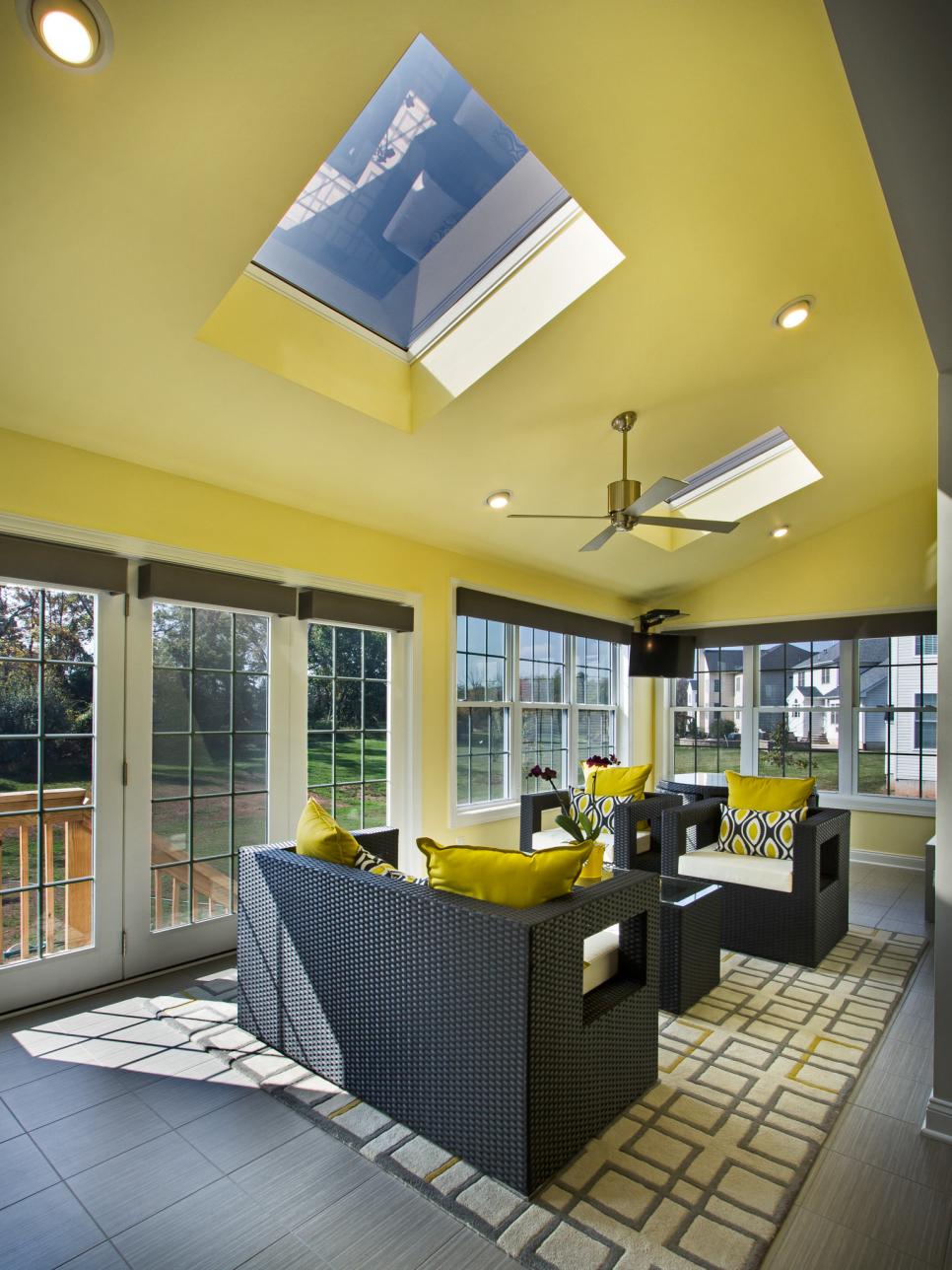 Sunroom with Yellow Ceiling and Skylights