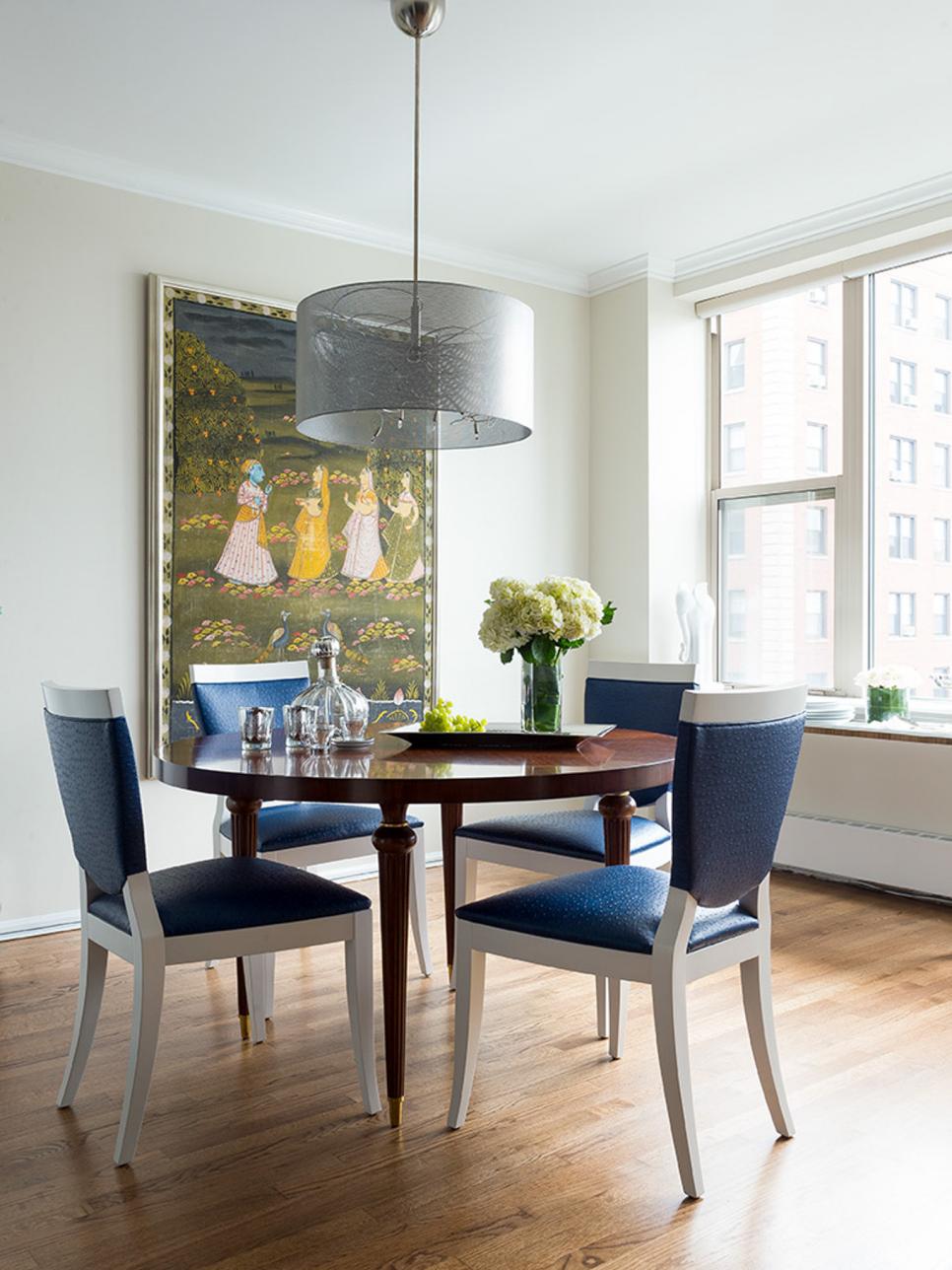 Eclectic Dining Room With Indian-Inspired Art and Metallic Chandelier