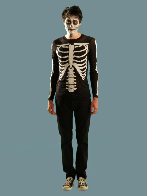Finish your skeleton look with a skeleton T-shirt and dark jeans. The simple outfit paired with the makeup makes a great costume.