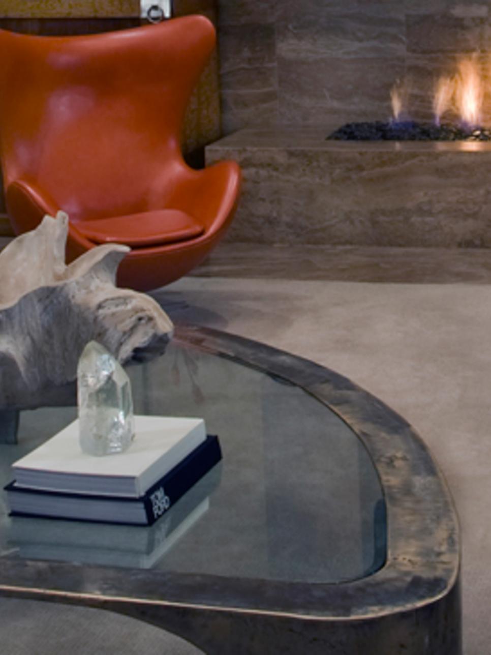 Glass Coffee Table and Leather Egg Chair by Granite Fireplace Hearth