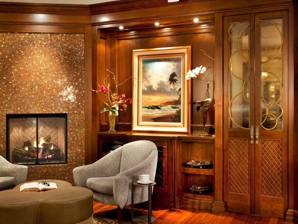 Cozy Sitting Area With Wood Paneling and Fireplace