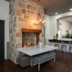 Casual Dining Space With Stone Fireplace
