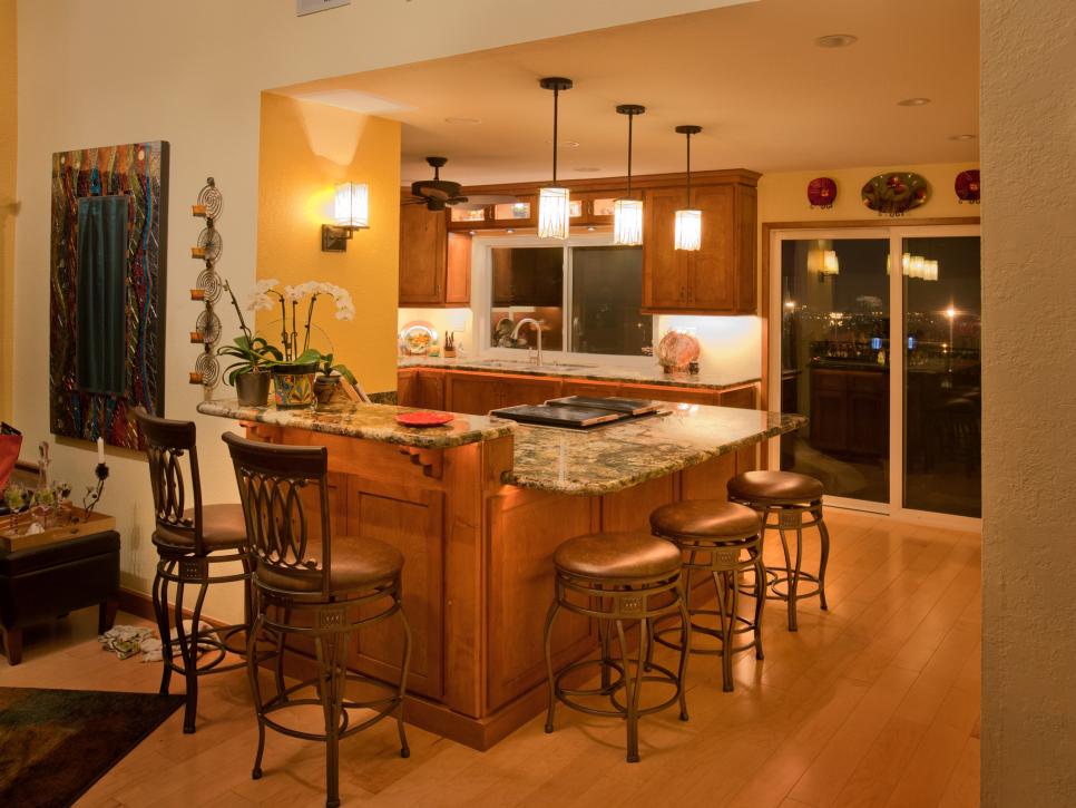 Eat-In Kitchen With Wood Island, Pendant Lights and Swivel Barstools
