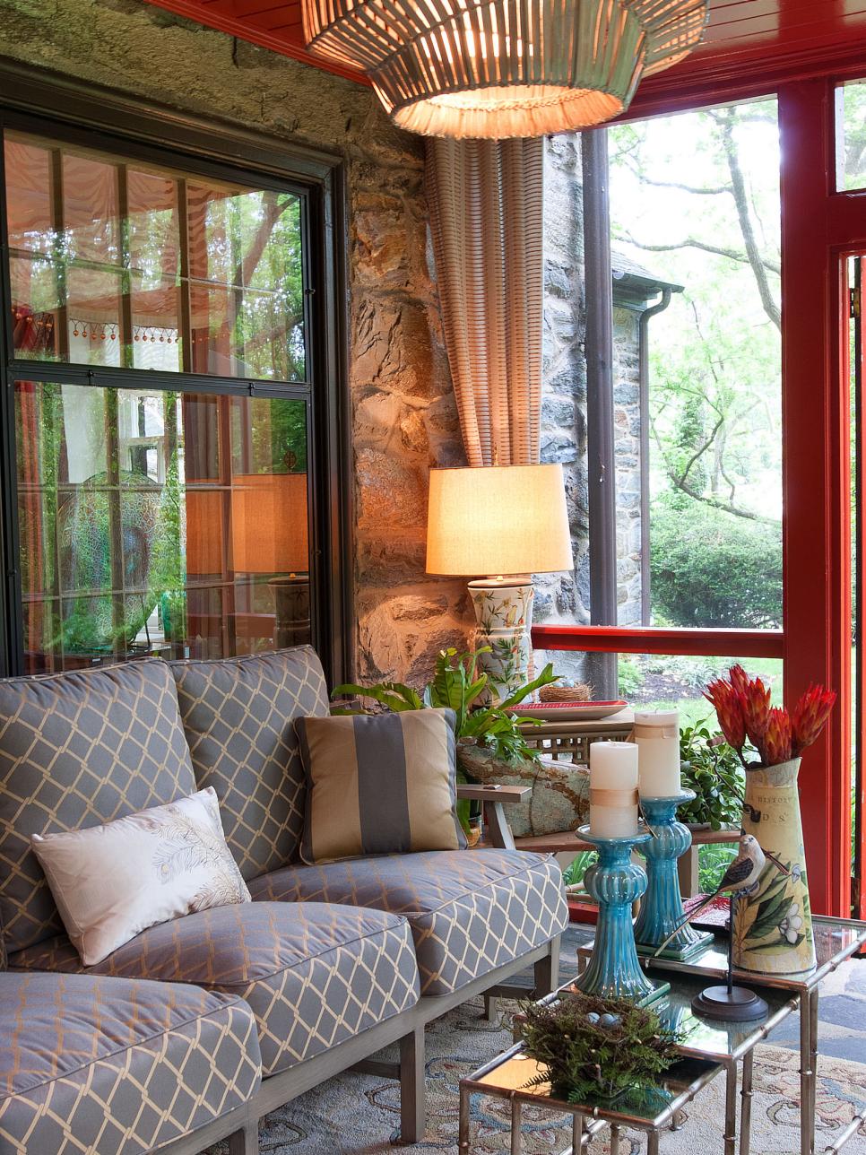 Eclectic, Red Sun Room With Outdoor Sofa and Nesting Tables