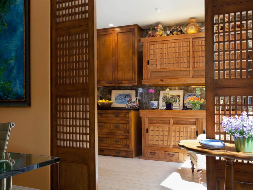 Asian Kitchen With Antique Cabinets and Pocket Doors