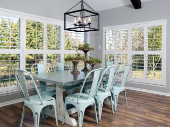 Gray Contemporary Dining Space With Blue Metal Chairs