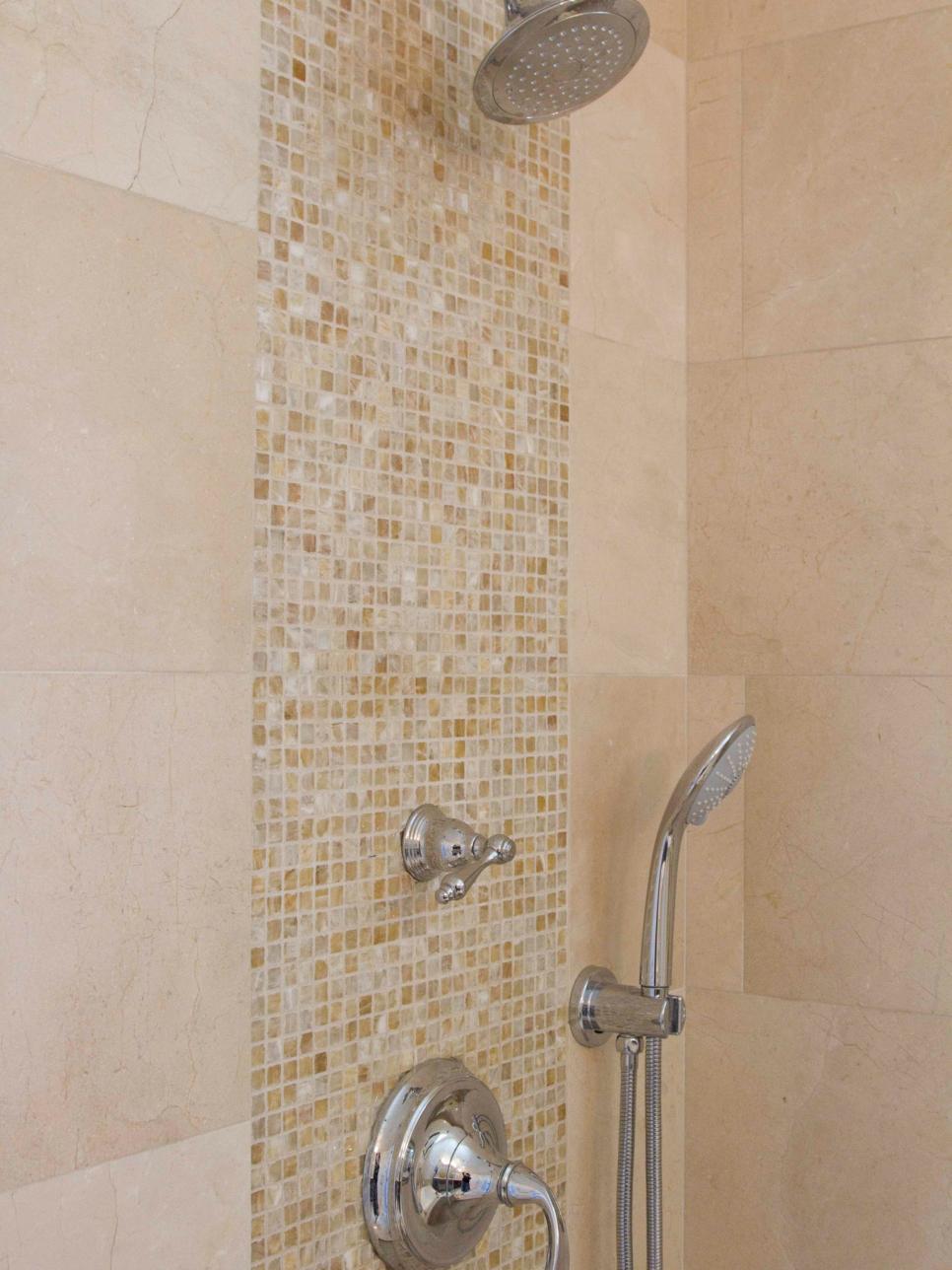 Neutral Tile Shower With Mosaic Tile Detail and Chrome Hardware