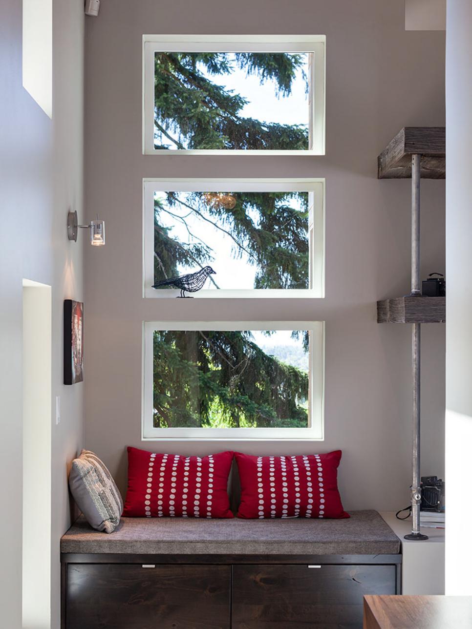 Modern Gray Reading Nook With Red Pillows