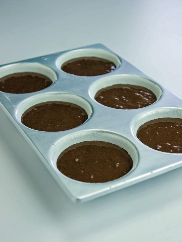 Pour Batter into ball pan filling each reservoir.