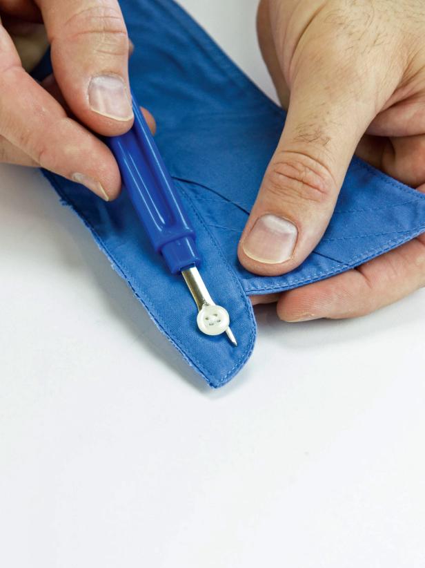 Remove the button from the collar, after measuring on dog.