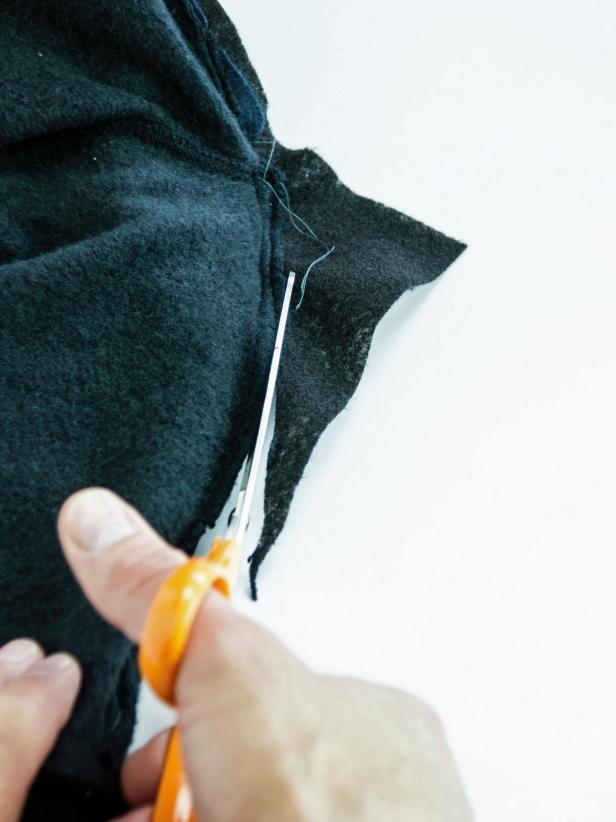 Be sure to back stitch at the beginning and end. Remove any excess fabric and stray threads from the inside.